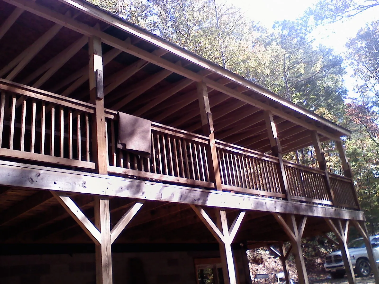 Timber framing under a new elevated porch and deck — Roof Leak Repair in Meriden by Roofing Brothers